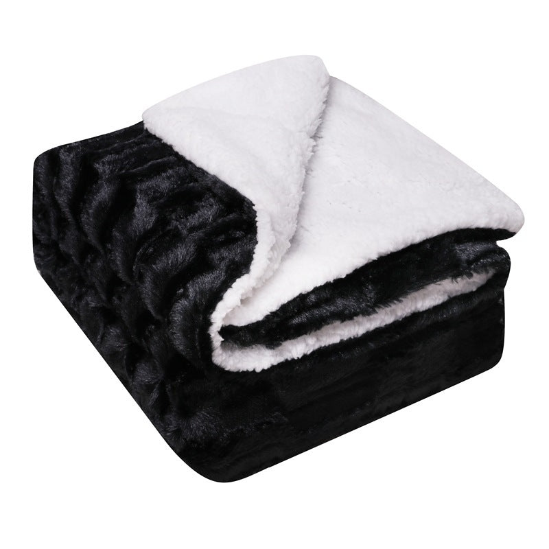 Black reversible flannel and fleece blanket, folded